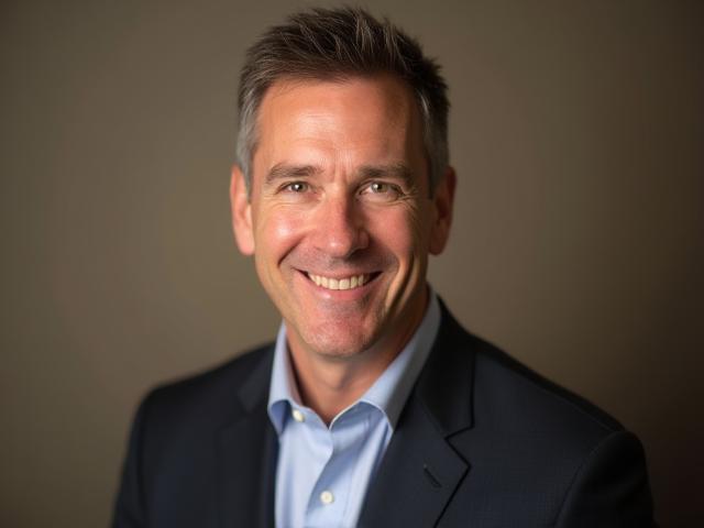 Professional portrait of Michael Smith, Head of Product Development at Bright Connect Network
